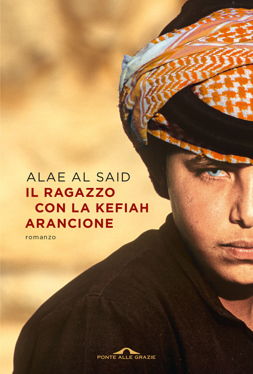 Il ragazzo con la kefiah arancione